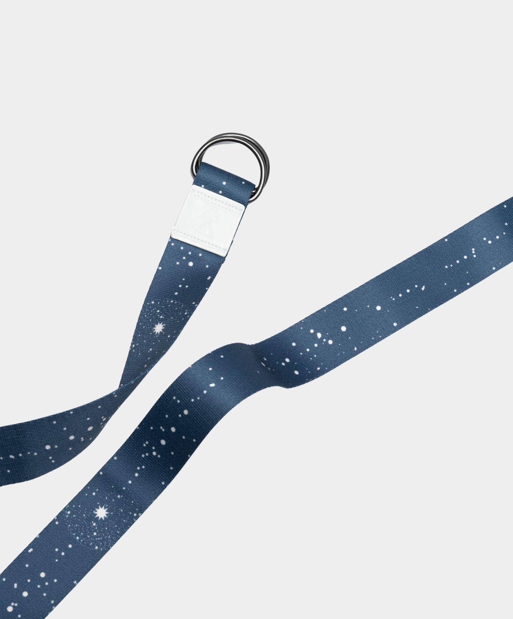 Navy blue lanyard with star pattern on a light gray background